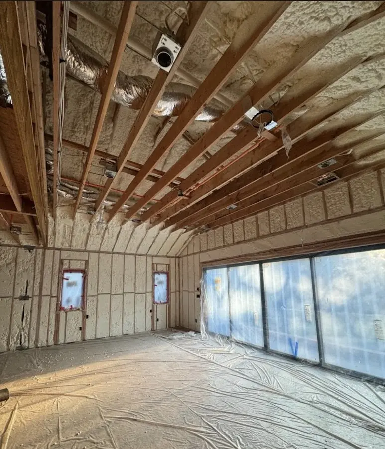 Interior walls and ceiling insulated with spray foam during new construction in Duluth